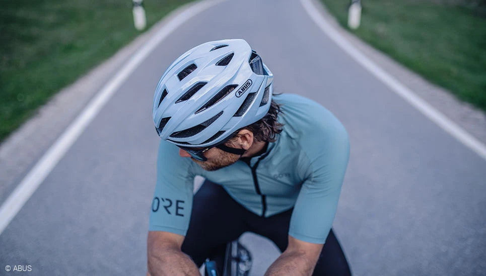 Man wearing an ABUS helmet.