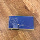 Photo showing the TSI-1 Tubeless sealant injector.  The photo shows the slight damage of the packaging.