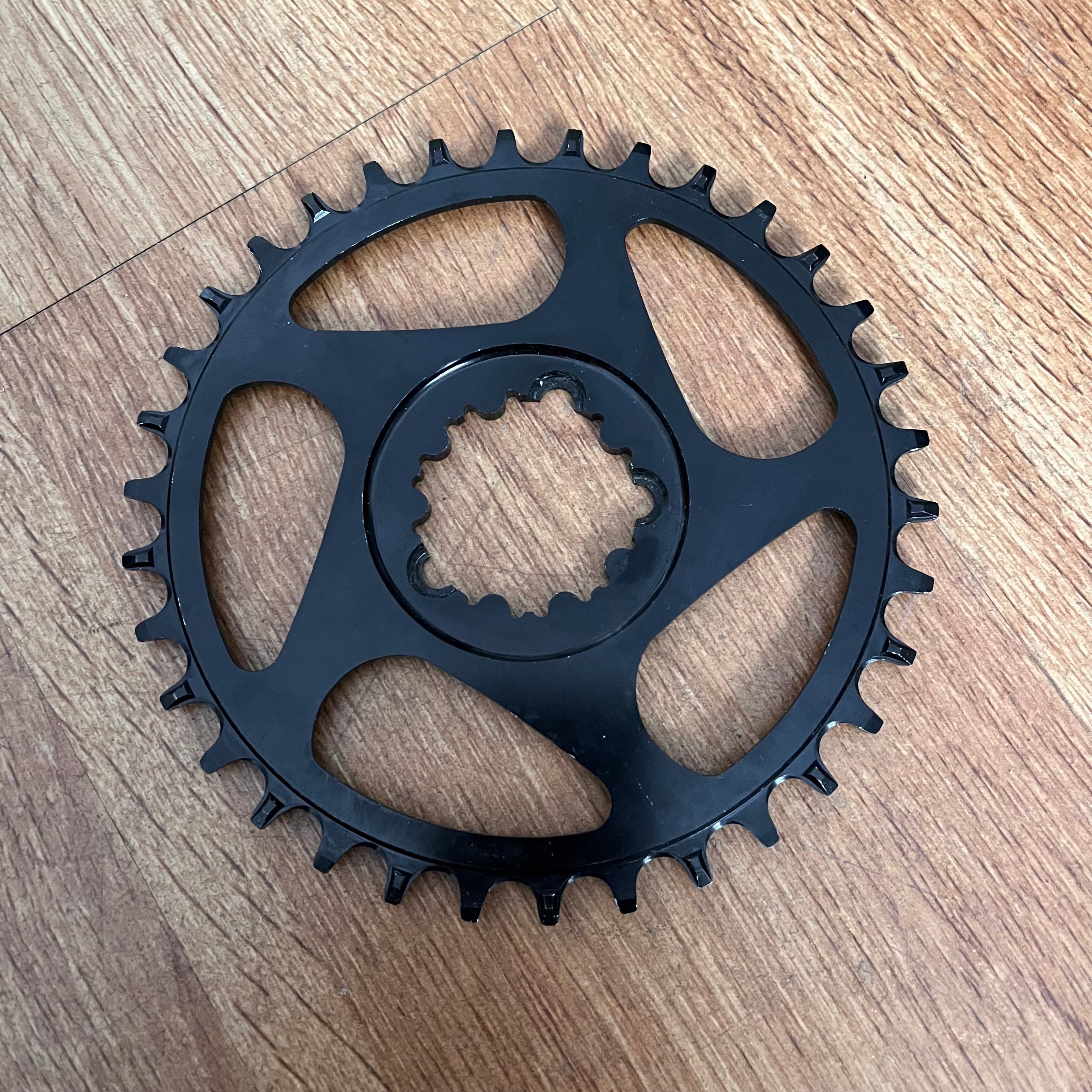 Shun MTB-04 GXP Narrow Wide Direct Mount Chainring 34 tooth - photo showing the wear of the chainring.