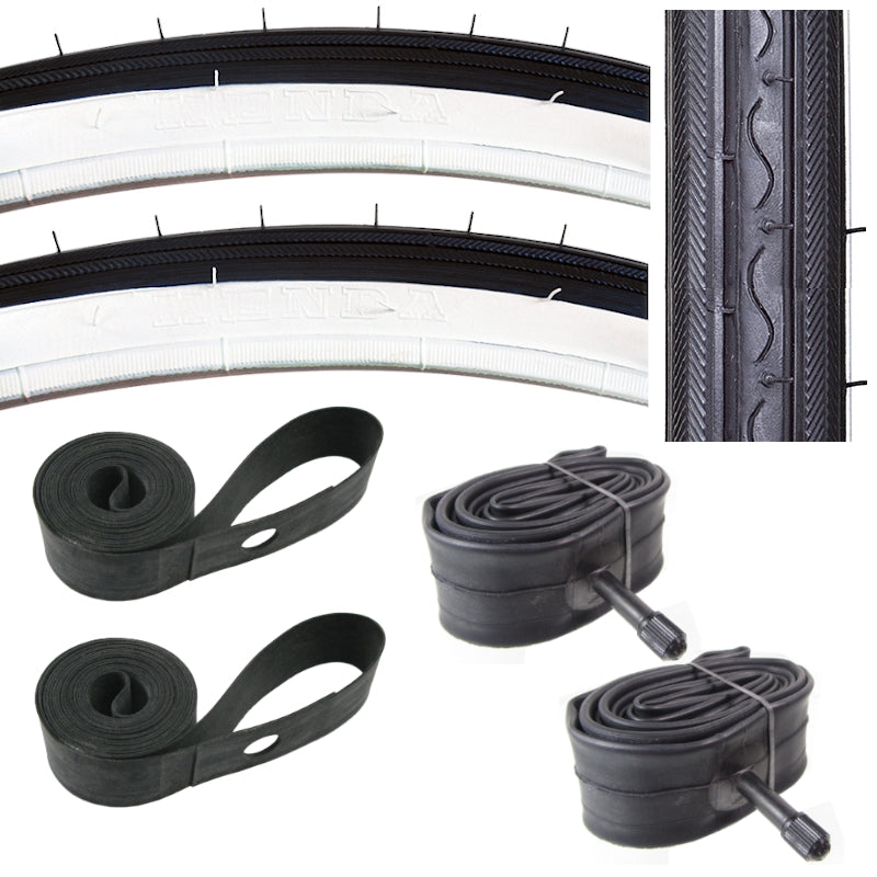 Kenda K40 26x1-3/8 whitewall tires with Schrader valve tubes and rubber rim strips.